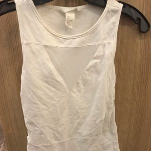 White body suit with mesh cut outs